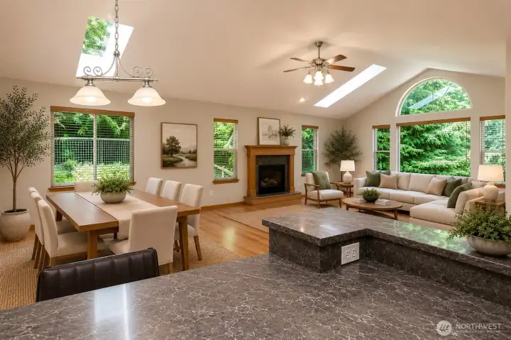 The kitchen is open to the dining and living rooms so you can stay in the conversation with guests while cooking! (Virtually staged) The kitchen is open to the dining and living rooms so you can stay in the conversation with guests while cooking! (Virtually staged)