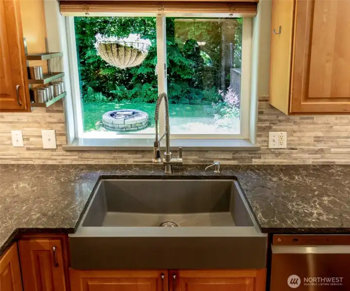 Love the farmhouse sink! And the tile backsplash is beautiful! Love the farmhouse sink! And the tile backsplash is beautiful!