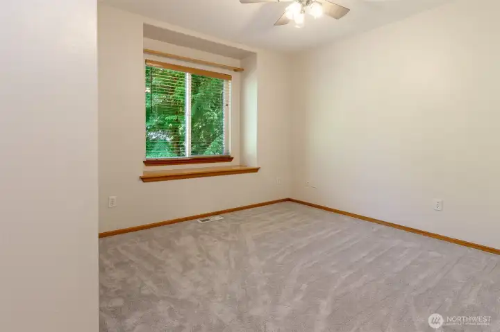 The window seat in the bedroom creates a warm nook for reading! The window seat in the bedroom creates a warm nook for reading!
