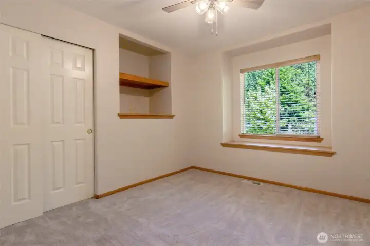 This bedroom has both a window seat AND a deep shelf unit built in! This bedroom has both a window seat AND a deep shelf unit built in!