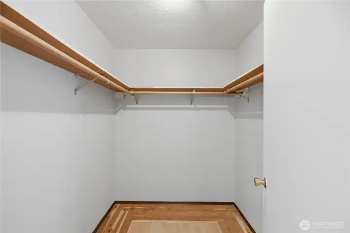 A walk-in closet keeps everything organized.