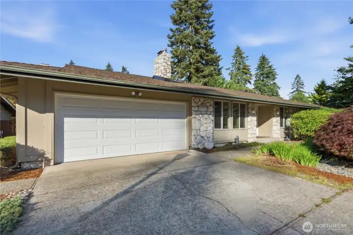 An oversized two-car garage offers extra flexibility.