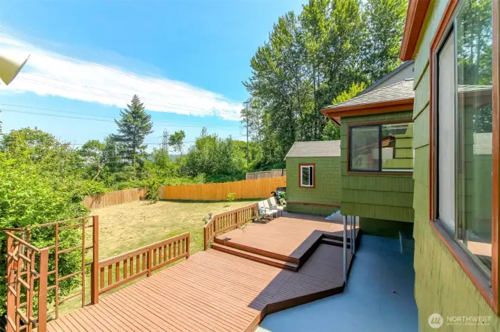 Back patio and deck backyard with fruit trees Back patio and deck backyard with fruit trees