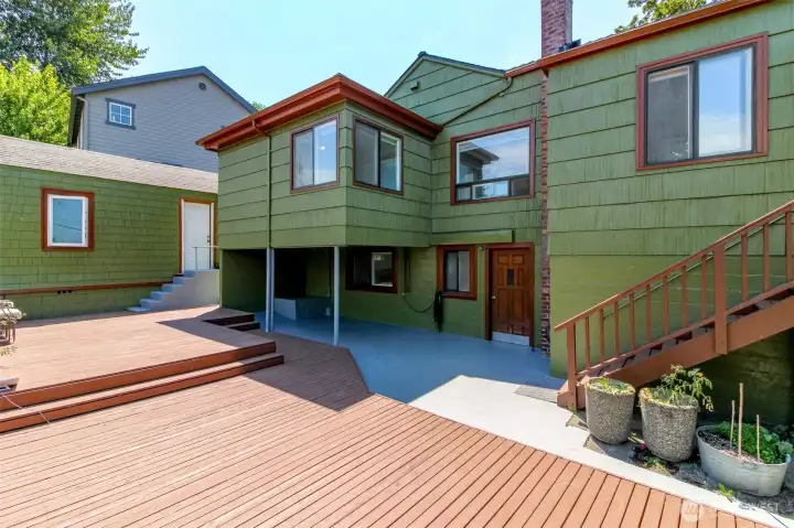 covered patio, deck and stairs to kitchen on main covered patio, deck and stairs to kitchen on main