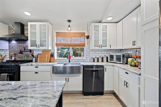 Beautifully updated gourmet kitchen with subway tile backsplash.