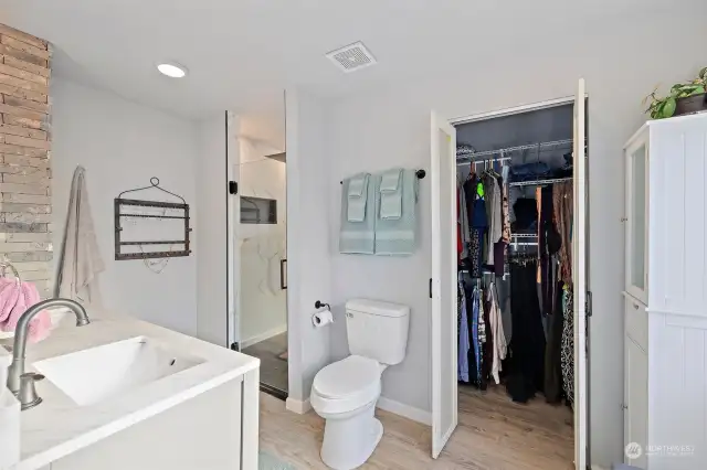 Primary bathroom with walk-in closet.