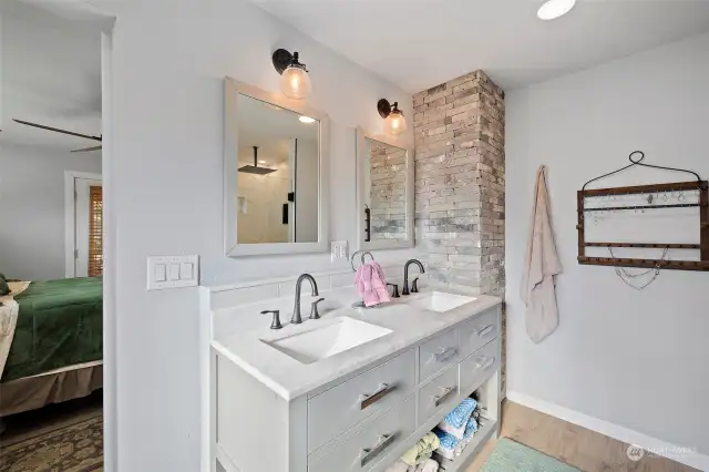 Primary bathroom has double sinks.