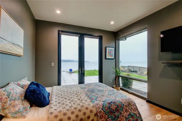 The guest room not only offers private patio access but also serves as a hobby room