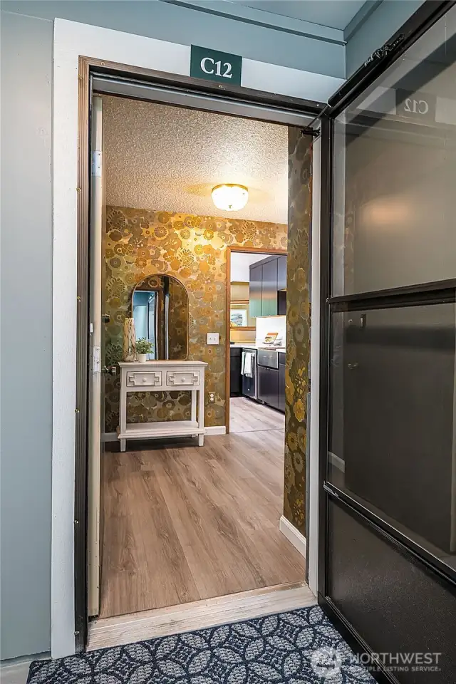 This condominium truly feels like a home with large entry and spacious floor plan.