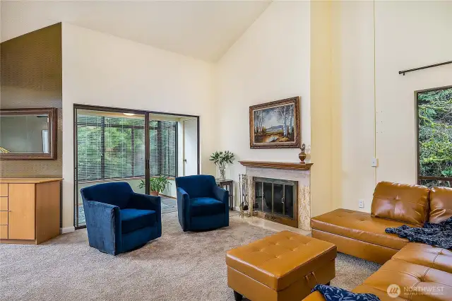 Top-floor corner location feels extra spacious due to high ceilings and solarium off living room.