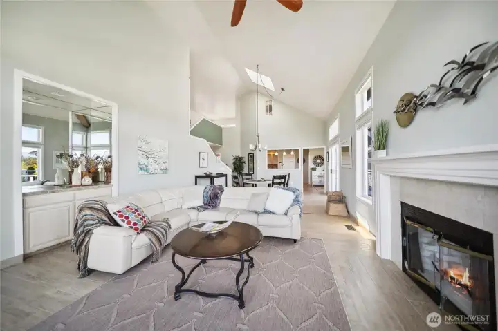 Spacious living room with cozy fireplace to enjoy on chilly days.