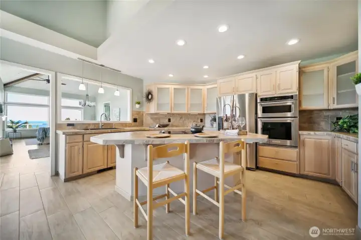 Updated kitchen with counter space to sit and enjoy the views.
