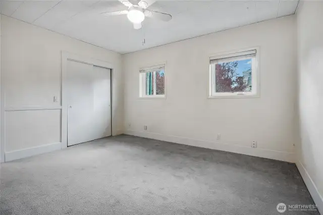 First bedroom suite, with a breezy ceiling fan.