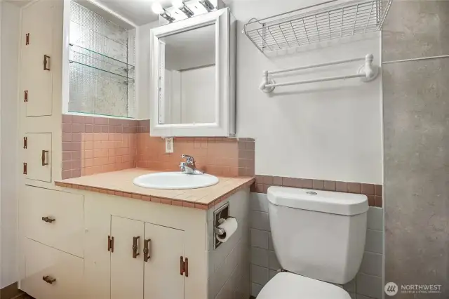 En-suite 3/4 bath off the first bedroom with plenty of storage.