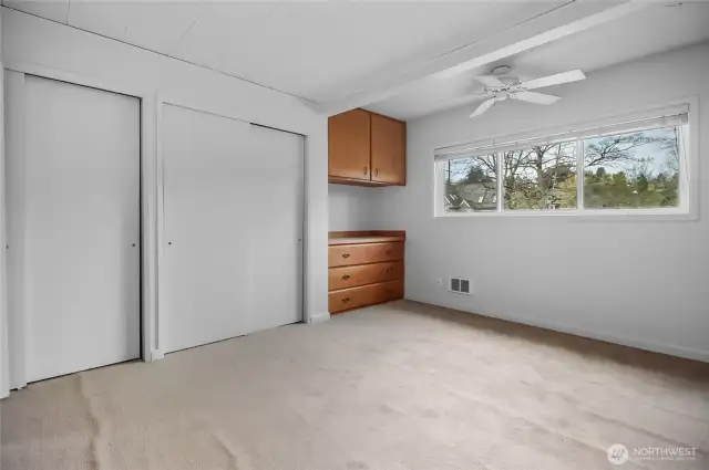 Ceiling fan & bright windows.