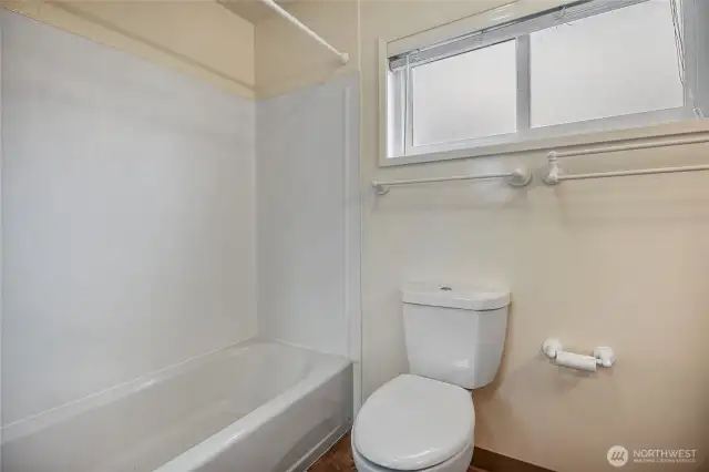 The second bedroom also includes a full en-suite bath.