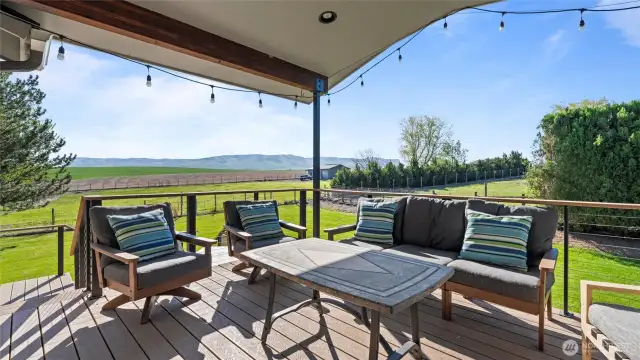 The tri-level deck is covered to provide a three-season outdoor space. The photo simply doesn't do justice to the perfectly framed views of the Blue Mountains and farmland.