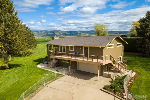 Situated toward the rear of the lot, the home offers Blue Mountain views and plenty of privacy.