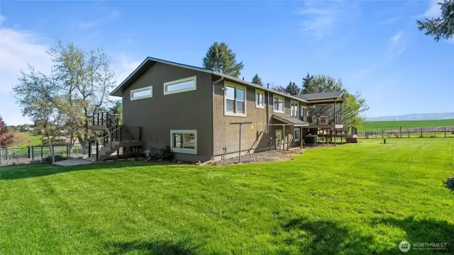 The grassy back and side yards provide room for yard game and maybe, someday, a pool!