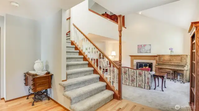 Enter to warmth and gleaming recently refinished hardwoods and new carpet throughout with waves of natural light from the walls of windows.