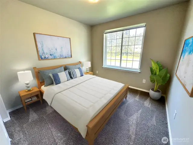 Photo is of virtually staged 2nd Bedroom