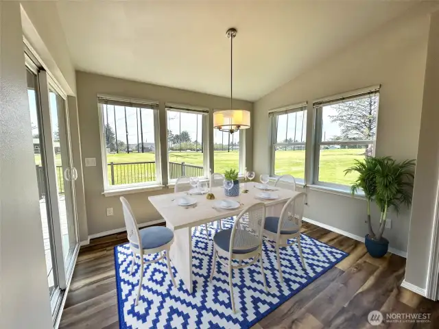 Photo is of virtually staged dining room