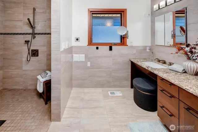 upstairs large shower with luxury finishes