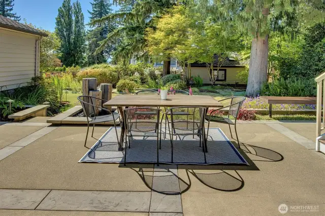 patio next to professionall landscaped backyard
