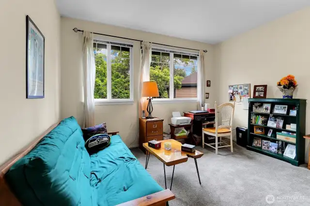 Bedroom 1 located on the South side of the unit with South facing windows.