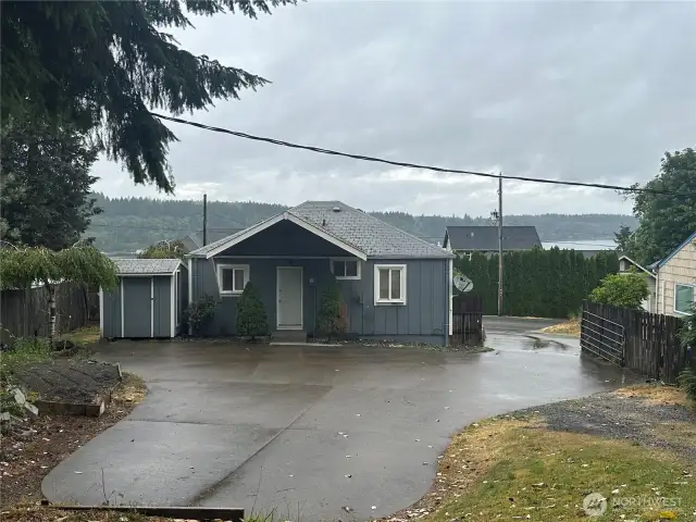 Back of house showing nice concrete parking area