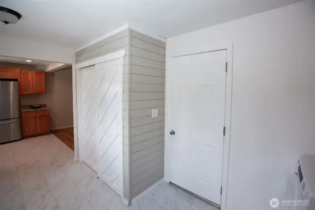 Expanded pantry offers so much storage! Door to right of pantry is access to attached garage.