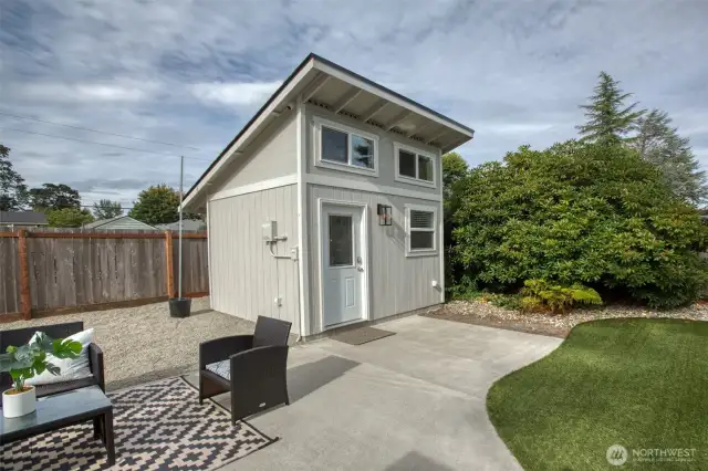 Detached office/studio - transom windows bring in great light, and yep - it's just as cute inside as it is on the outside!