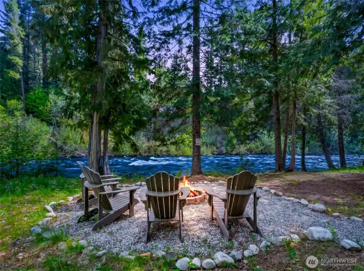 Rare riverfront setting nestled among towering trees offers exceptional privacy while still embracing open views of the Chiwawa River. Rare riverfront setting nestled among towering trees offers exceptional privacy while still embracing open views of the Chiwawa River.