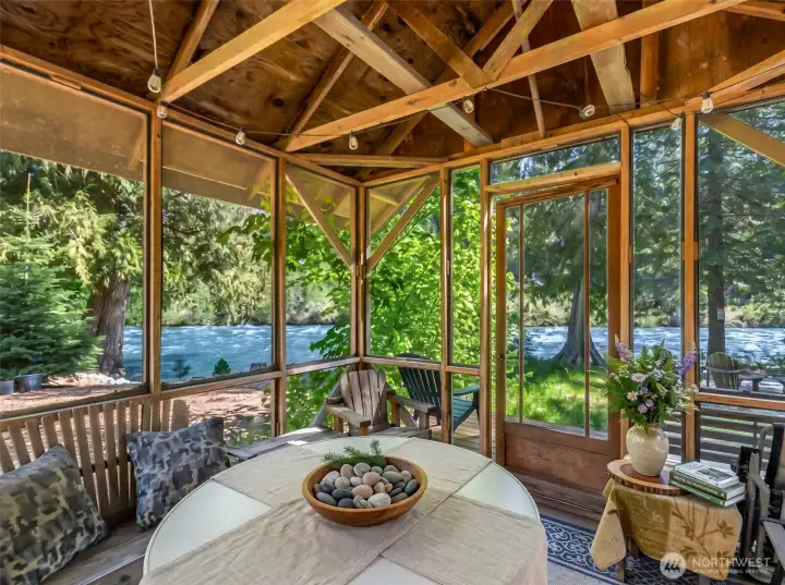 Screened riverside gazebo creates the perfect space for outdoor dining, morning coffee, or evening conversations protected from the elements. Screened riverside gazebo creates the perfect space for outdoor dining, morning coffee, or evening conversations protected from the elements.