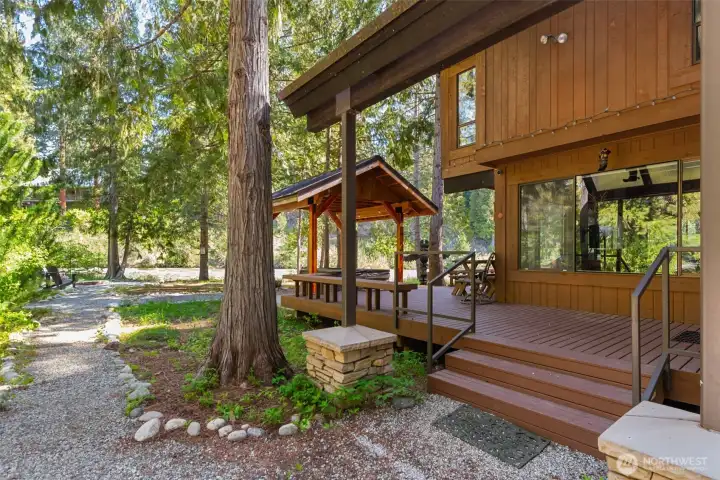 Experience true Pacific Northwest living with direct access to the Chiwawa River, ideal for relaxing, entertaining, and enjoying the serenity of the mountains. Experience true Pacific Northwest living with direct access to the Chiwawa River, ideal for relaxing, entertaining, and enjoying the serenity of the mountains.
