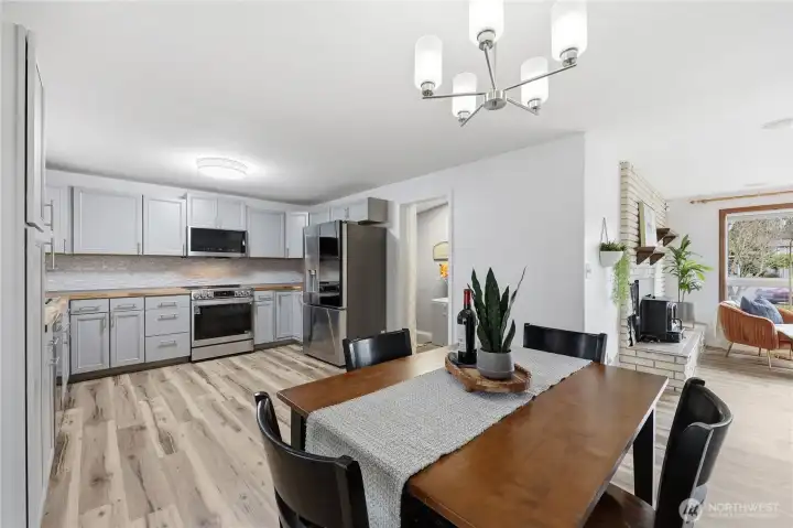 Seamlessly connected kitchen and dining area designed for easy conversation and everyday living.