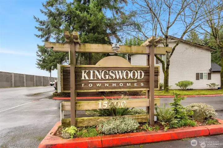 Entrance to complex with playground, sport court and POOL!