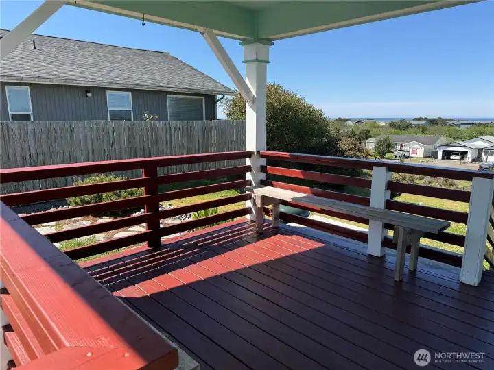 Covered deck with those wonderful ocean views, breeze and sound.