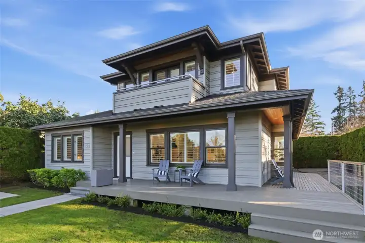 Wrap around porch continues around to meet French doors off the dining area. Classic roof angles add interest and character.
