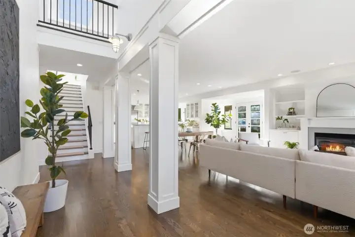 Two story entry offers a peek of the upper level and skylights.