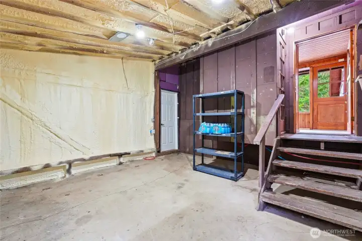 Mud Room with storage closet.