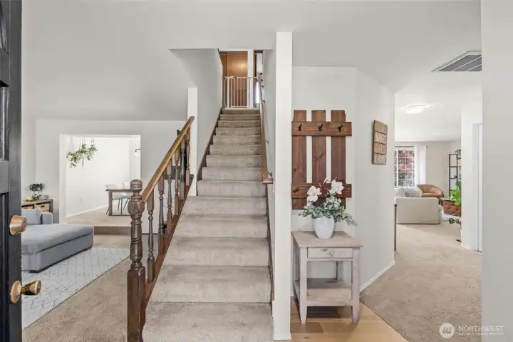 Inviting entry that opens into the home’s light-filled interior