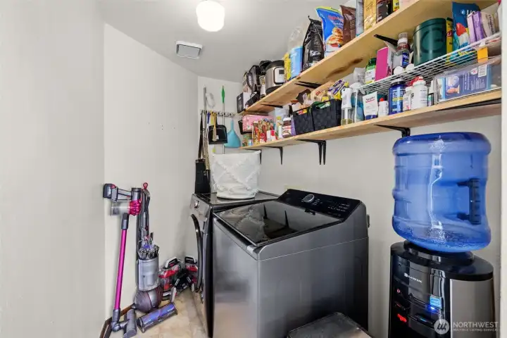 Utility room off the kitchen for added everyday convenience