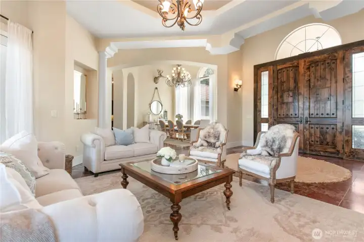 The front living area looking to the front doors and formal dining area