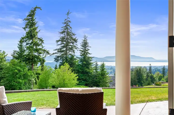 The patio sitting area just outside the Primary suite doors.  Perfect spot to add a hot tub.