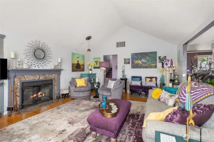 Large Living rooom with Vaulted Ceiling and fireplace.