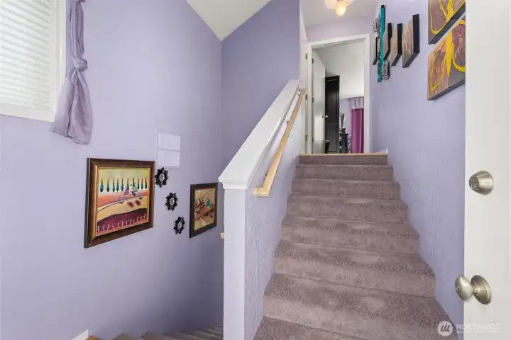 Stairs to Primary Bedroom, and bridgeway to Garage!!!