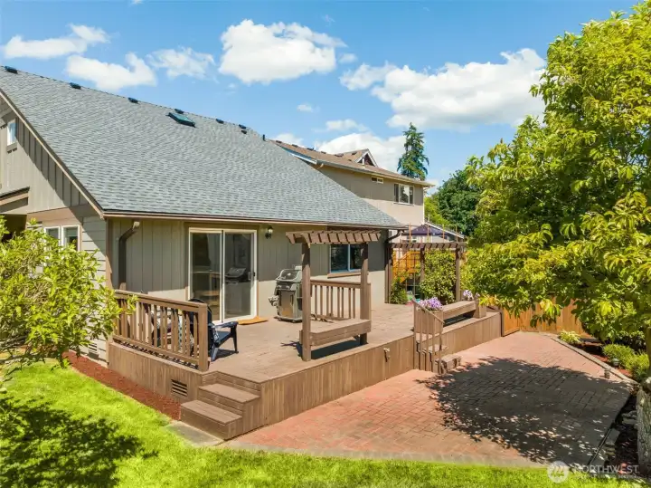 Enjoy entertaining with a back deck and patio