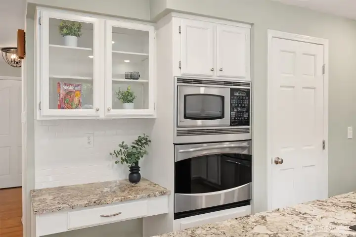 Beautifully Designed for Effortless Entertaining - This Chef's Kitchen Boasts White Cabinets & Granite Counters