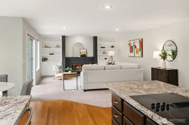 The Chef's Kitchen is Open to the Family Room with Wood Burning Fireplace
